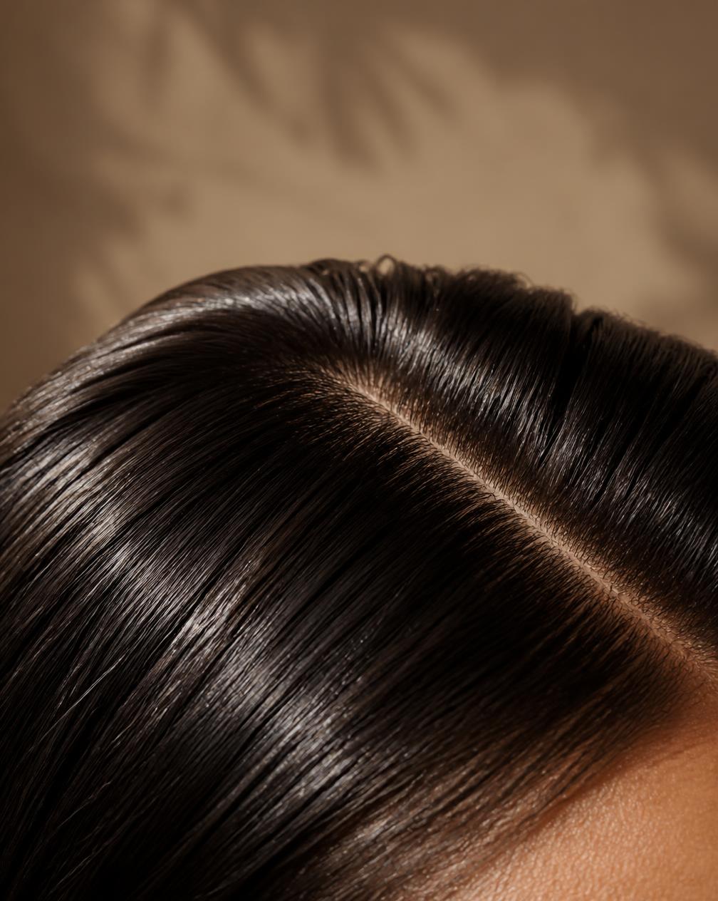 Close-up of healthy hair and scalp parting